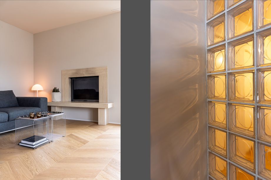 Wohnungsumbau Aarau mit offener Küche, Kochinsel und durchgehendem Fischgratparkett